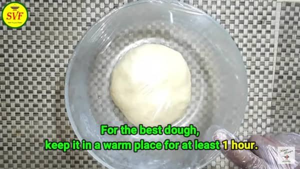 cover dough ball with wrapping sheet