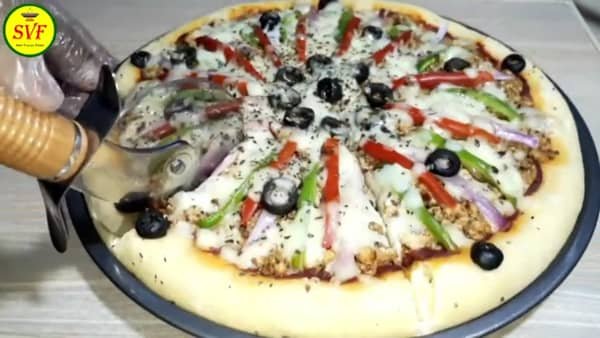 cut the pizza with a pizza cutter