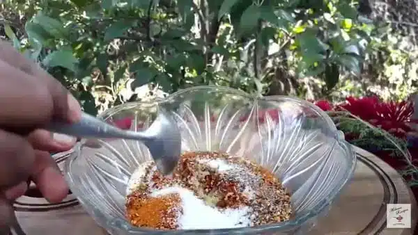 combine seasoning ingredients in a mixing bowl