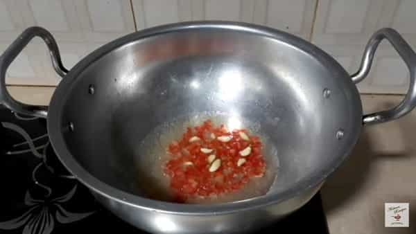 add in the oil diced carrot and garlic cloves