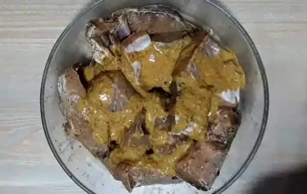apply batter to the fish pieces