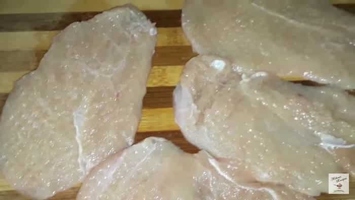 flatten chicken slices with mallet