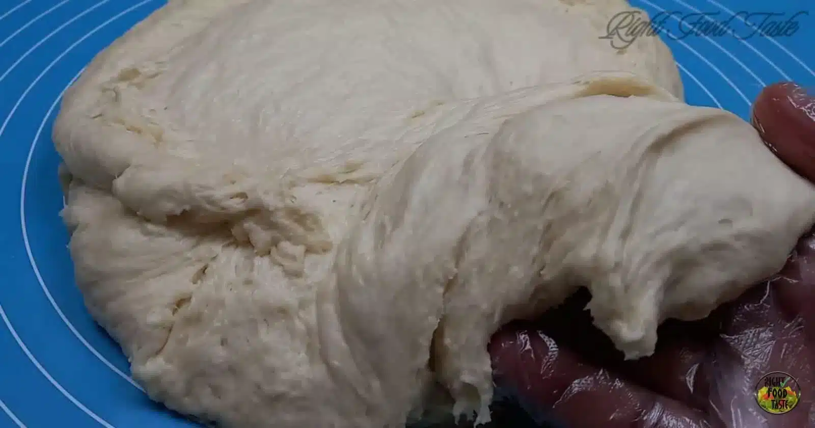 Soft pizza dough after rising, ready to shape