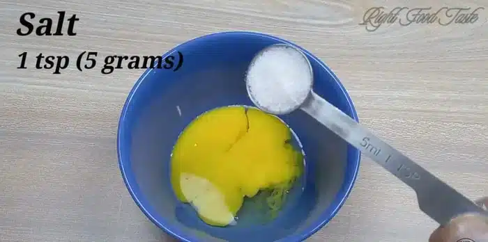 crack an egg and add salt