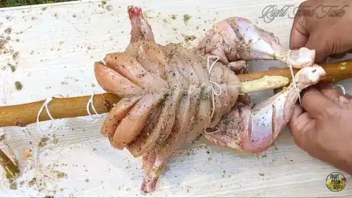 skewering and trussing the chicken