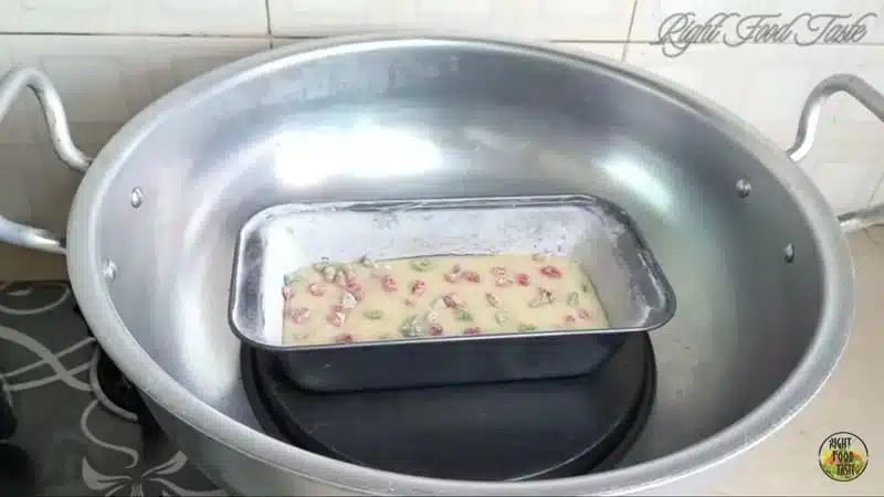 placing the loaf pan inside the cooking pan