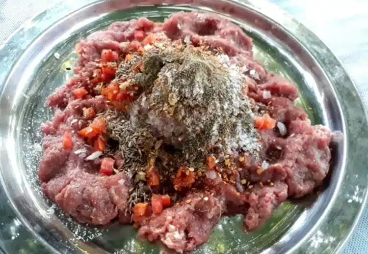 mixing of minced meat and chapli kabab ingredients