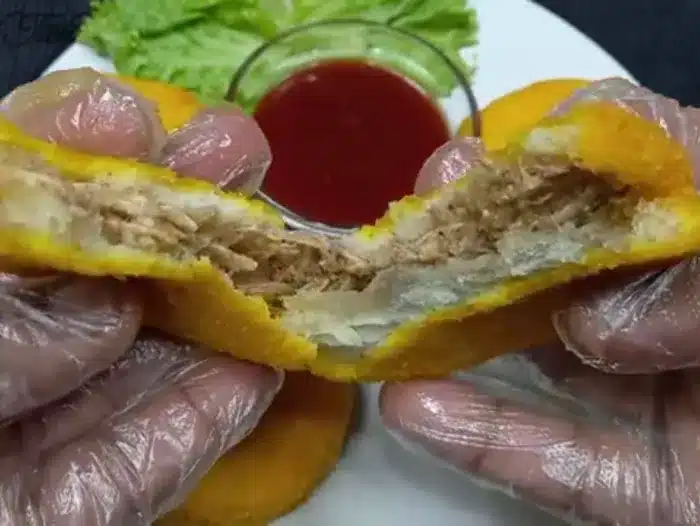 breaking a patty to show its inner side
