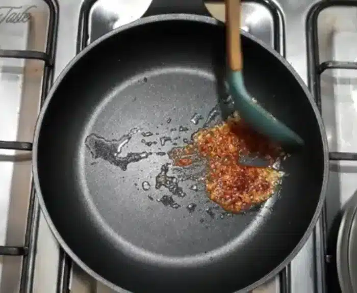 add red chili powder and sauté it