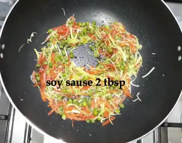 sprinkle sugar, add soy sauce, and ground black pepper