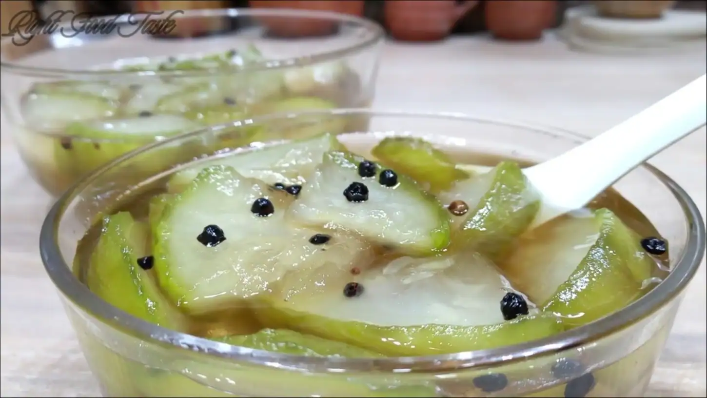 serving freshly prepared lauki ka murabba in a glass bowl