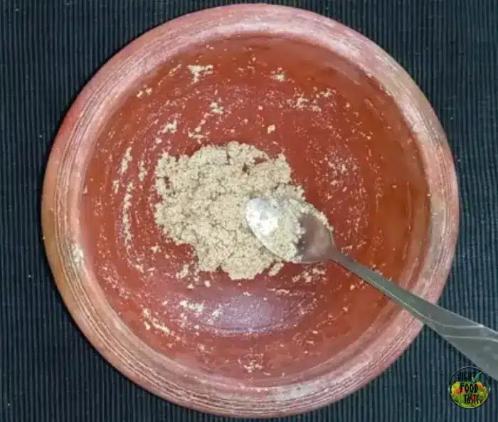 grinding a smooth thandai paste