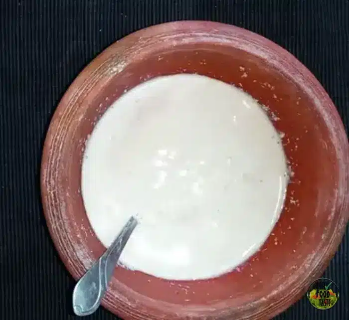stirring the thandai mixture